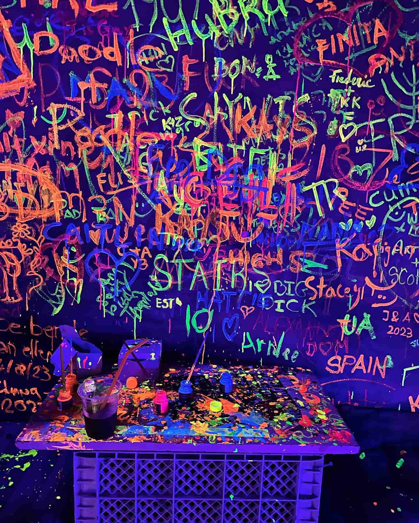 The neon kissed walls and tables at this Chiang Mai nightclub
