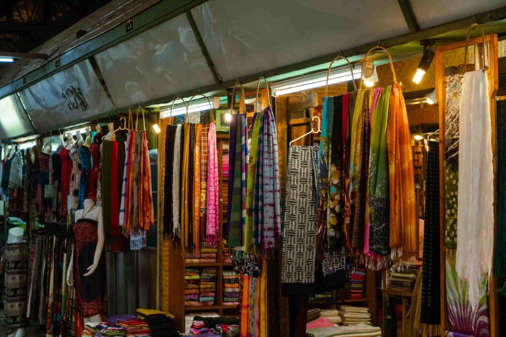 Silk scarves hanging at the night bazaar
