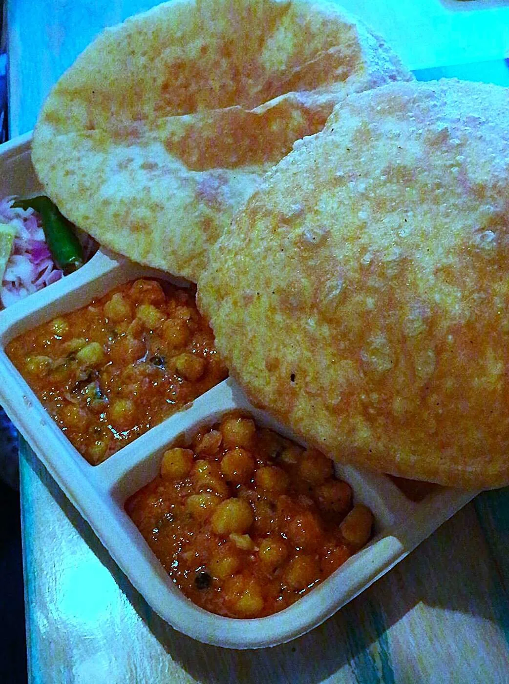 A thali plate of chole bhature, classic street food in Delhi, India