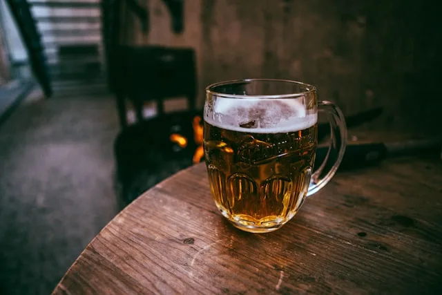 a pint glass of pilsner urquell from prague czech republic