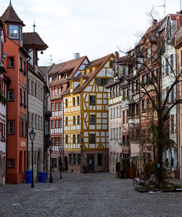 colorful historic buildings on a cobbled street in nuremberg germany
