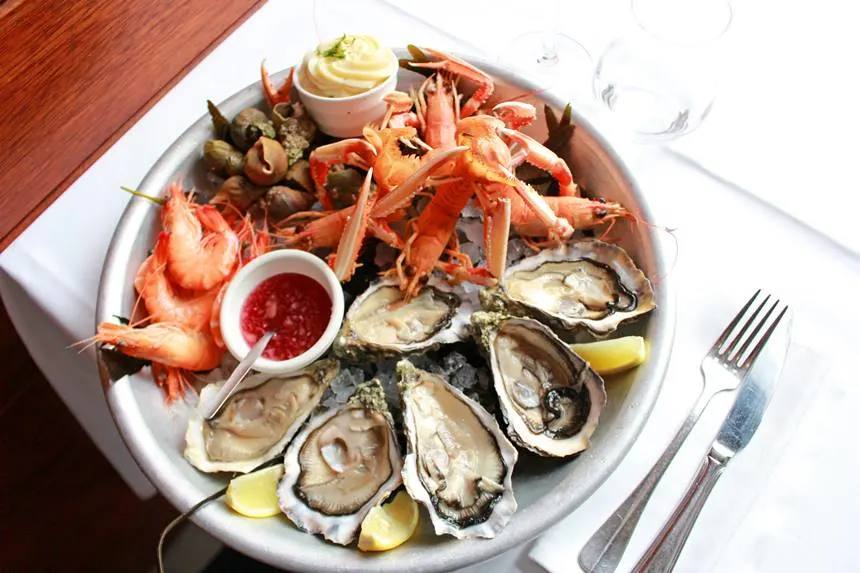 a seafood platter with prawns, langoustines, oysters and whelks from le chatillon fish restaurant in boulogne-sur-mer france
