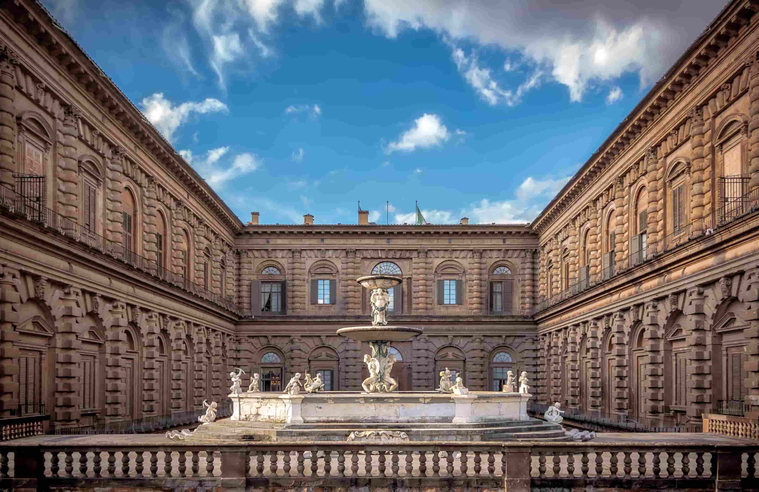 The exterior of Pitti Palace with its fountain