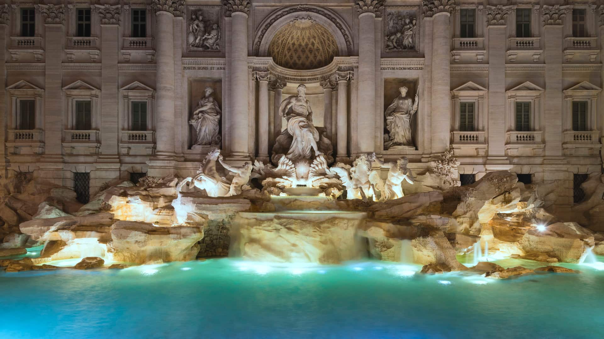 The Trevi Fountain lit up at night