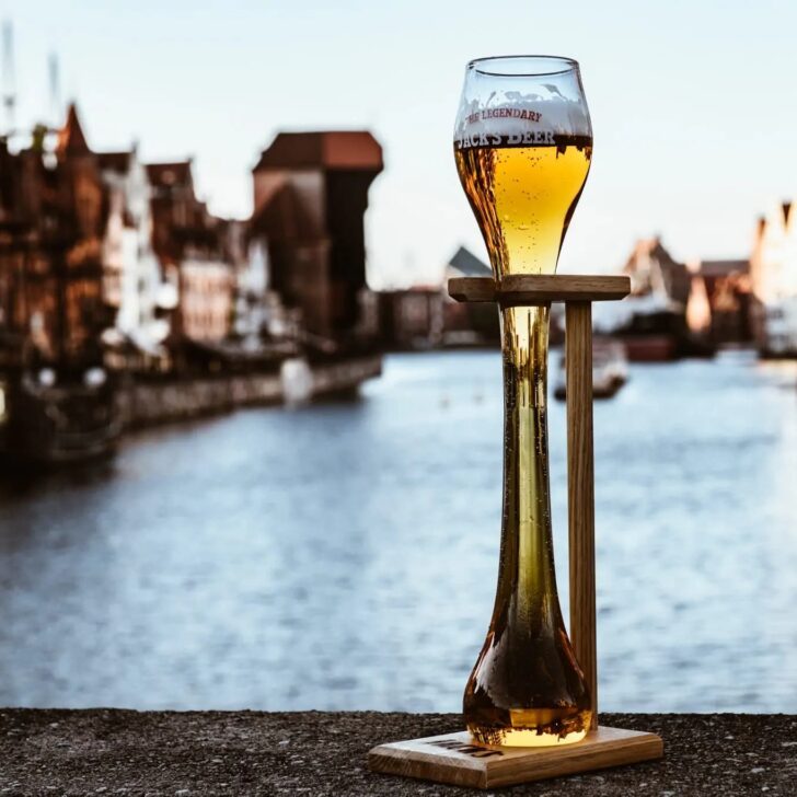 a liter glass of jack's beer in front of the motlawa river in gdansk poland