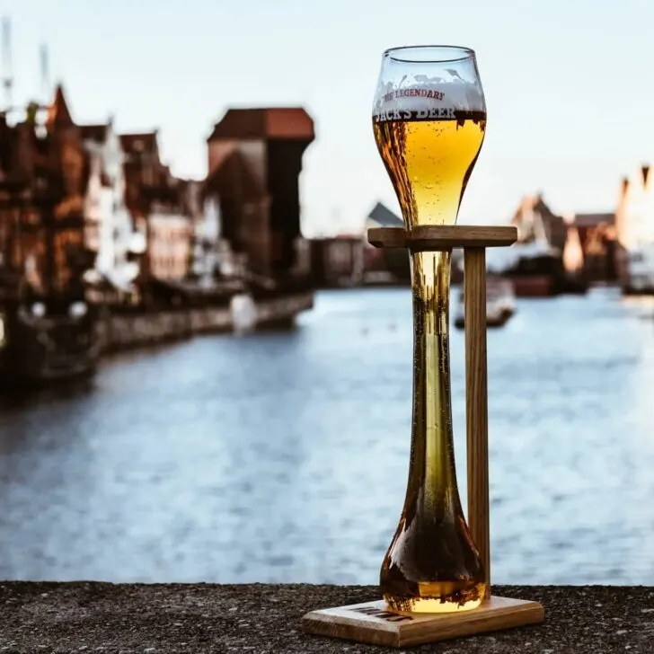a liter glass of jack's beer in front of the motlawa river in gdansk poland