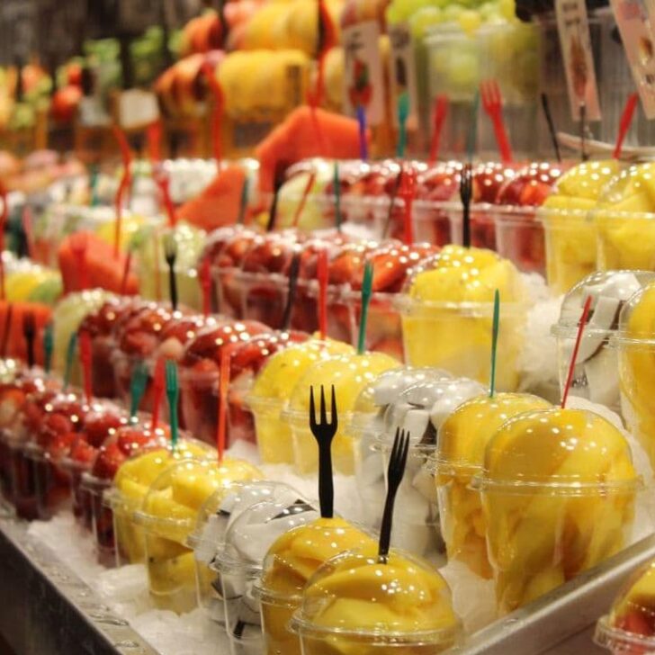 Rows of fresh fruit cups in Phuket