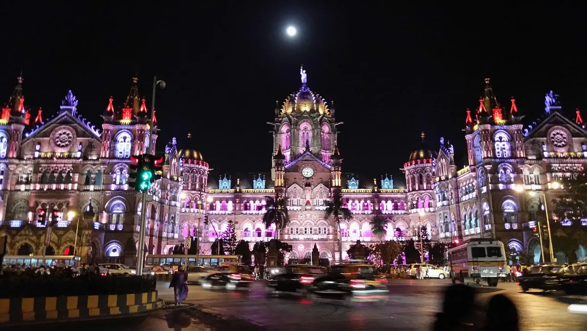 Chhatrapati Shivaji Maharaj Terminus illuminated at night in Mumbai, India