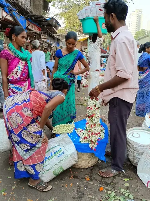 Locals buying flowers in Mumbai, India