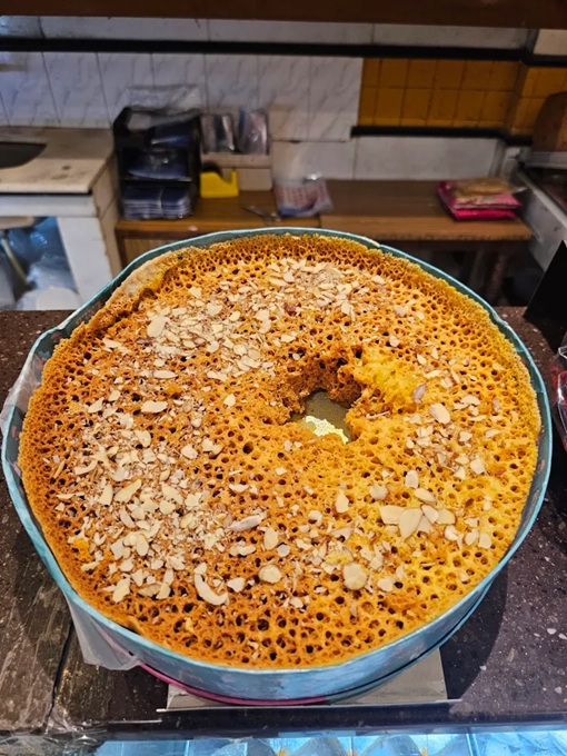 Ghevar, a popular sweet treat in Jaipur, India
