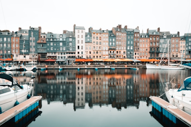 tall townhouses on the harbor at honfleur northern france 
