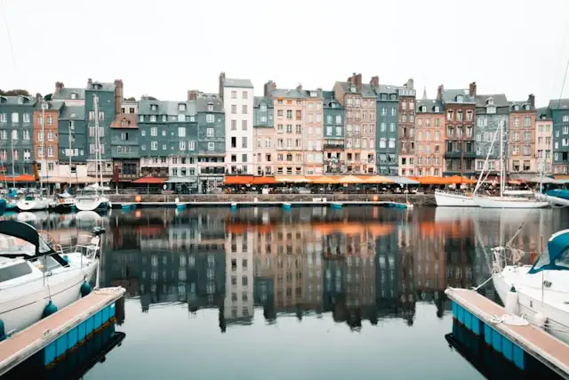 tall townhouses on the harbor at honfleur northern france