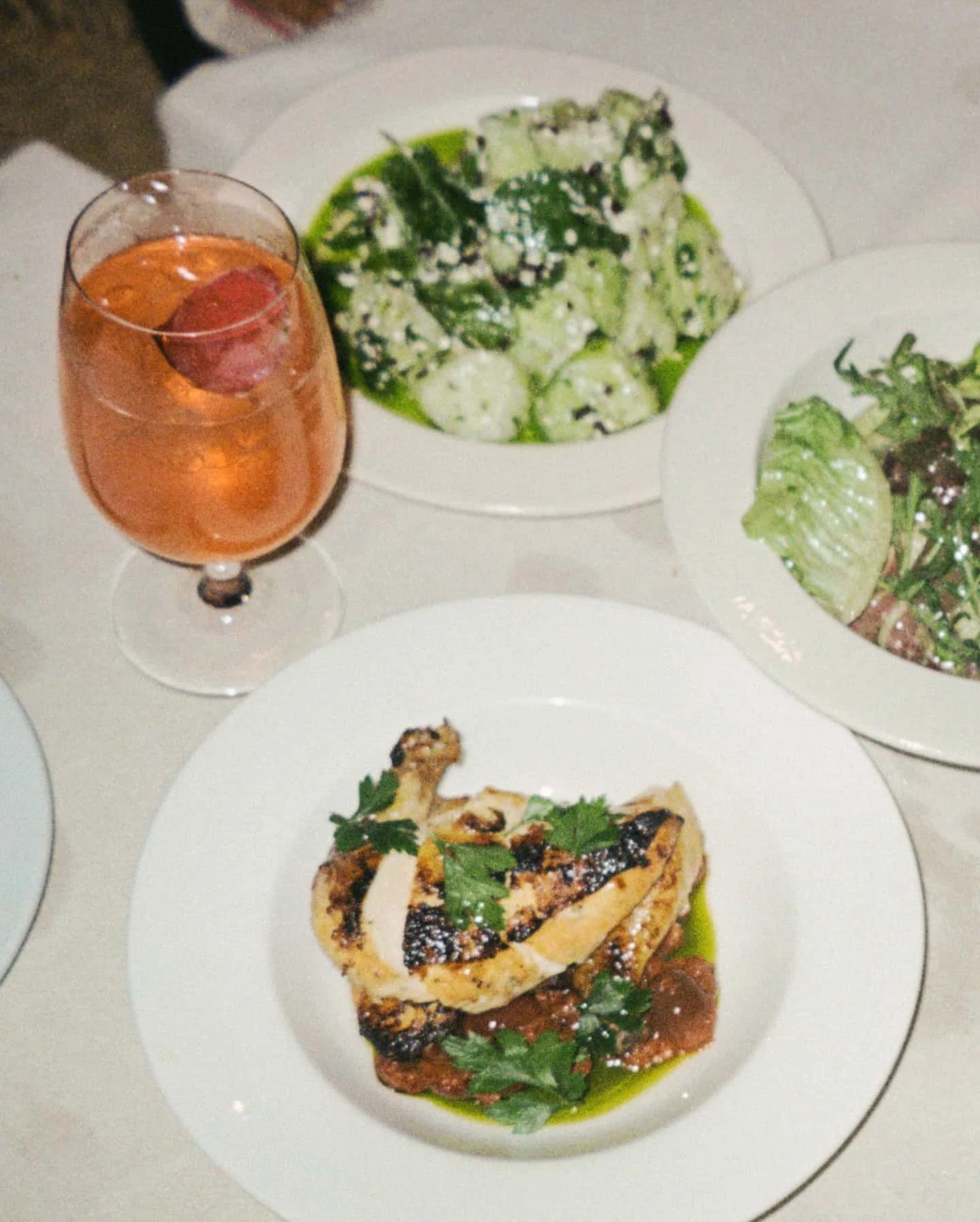 An array of Italian dishes and aperol spritz