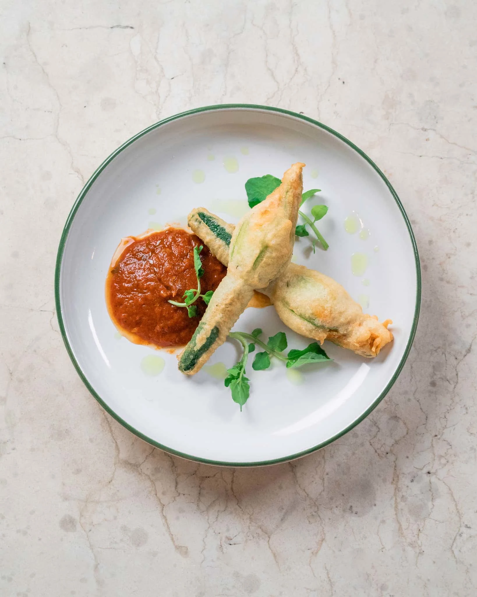 Deep fried and stuffed zucchini flowers