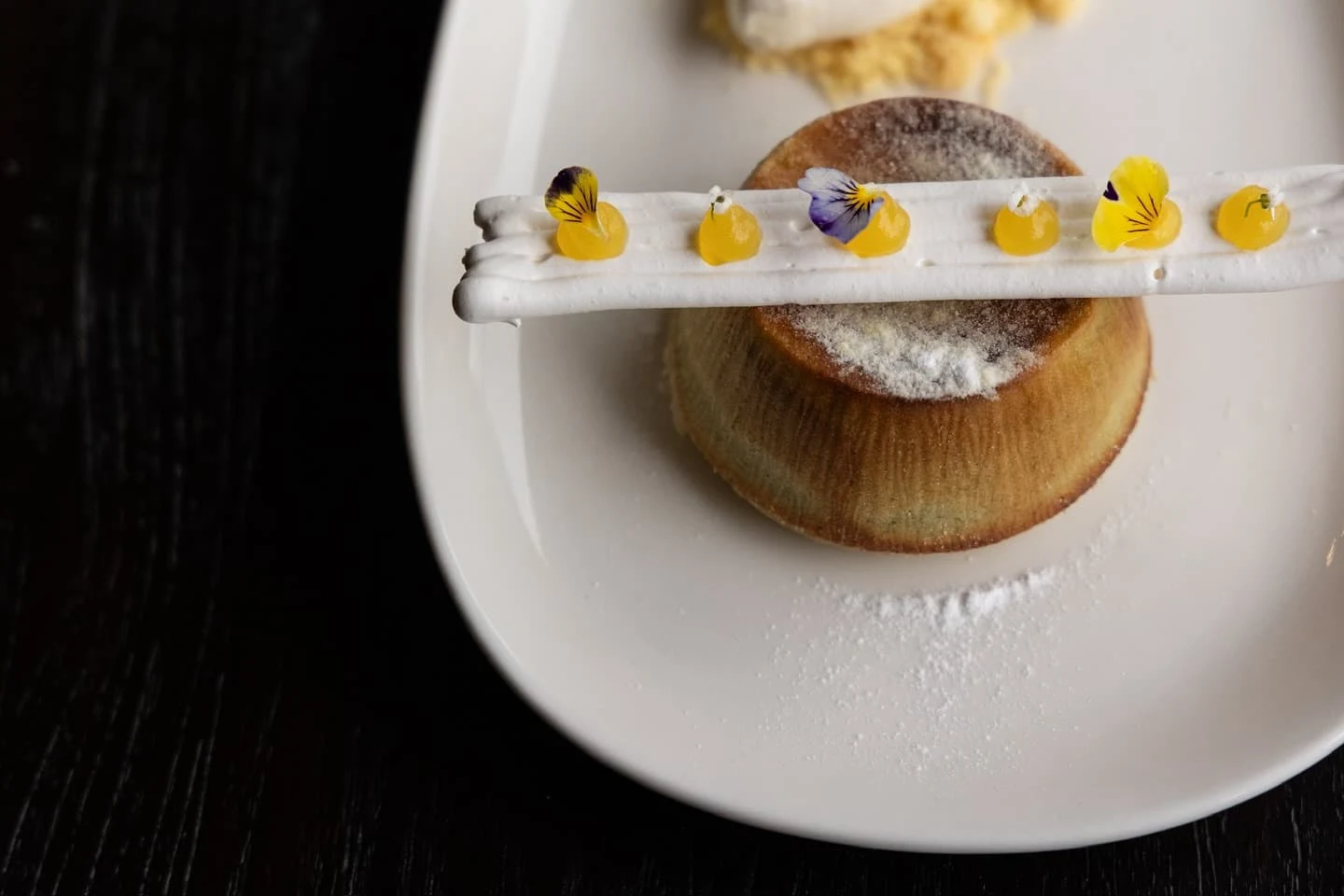 Dessert: meringue, gel, edible flowers, almond