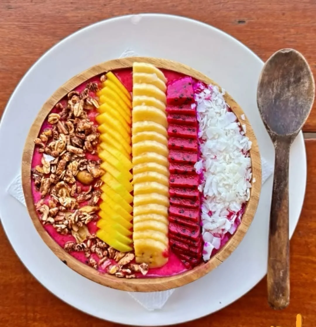 Smoothie bowl with dragon fruit, pineapple, coconut and banana