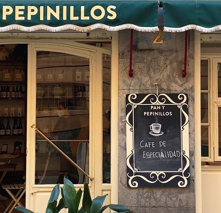pan y pepinillos is one of the best cafes in madrid with a traditional green awning