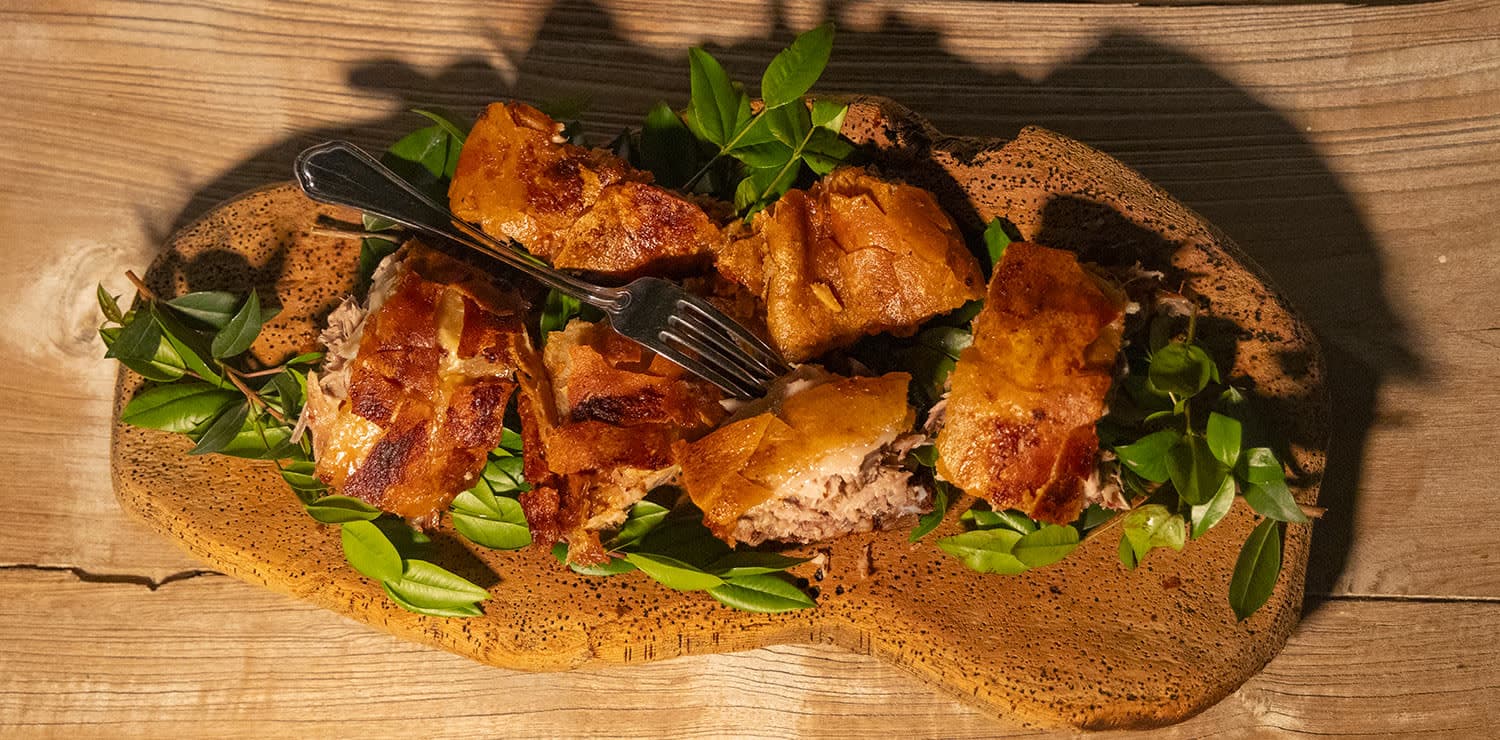 porceddu is a sardinian delicacy of spit roasted pork