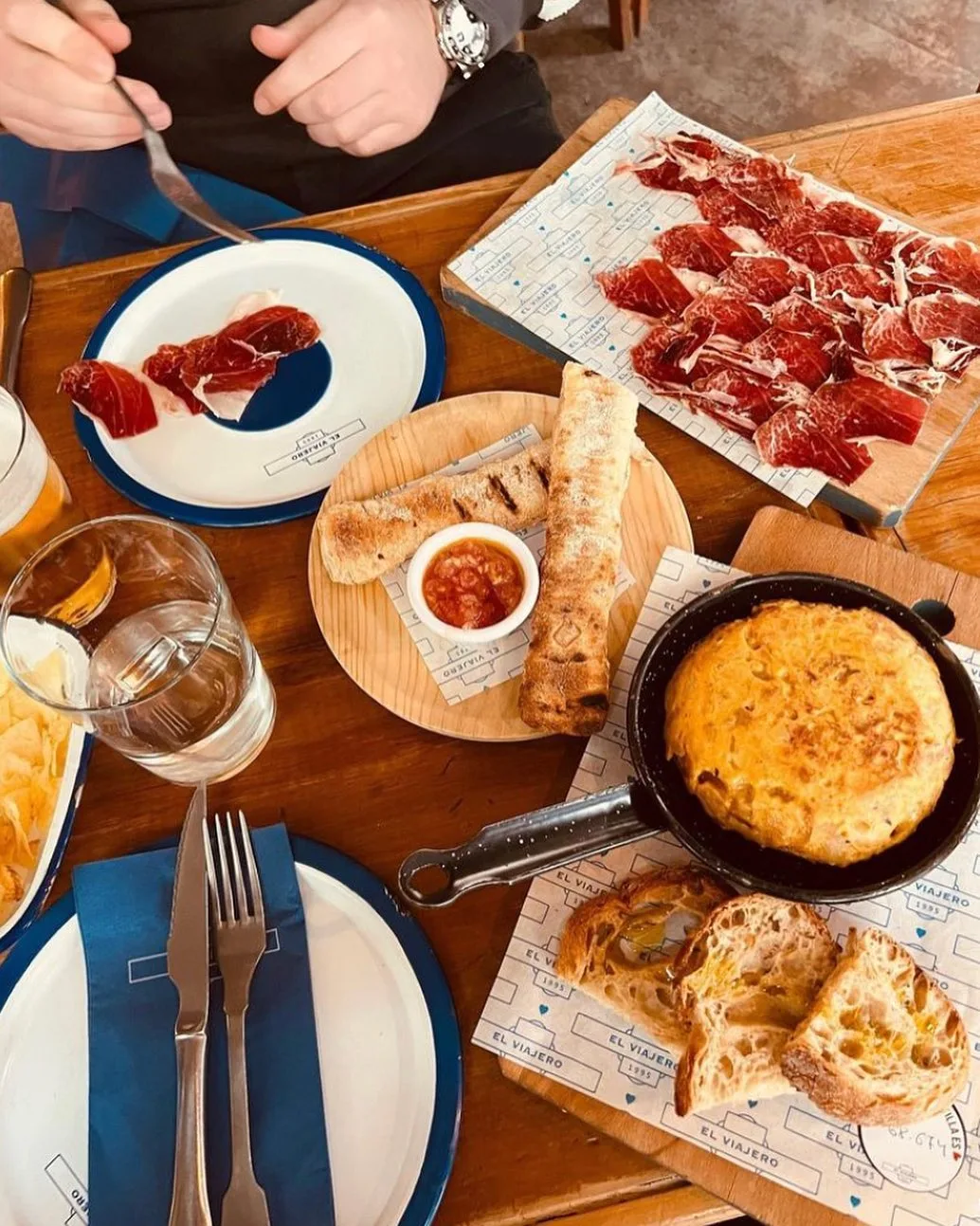 a selection of tapas including iberian ham and bread from el viajero madrid spain 