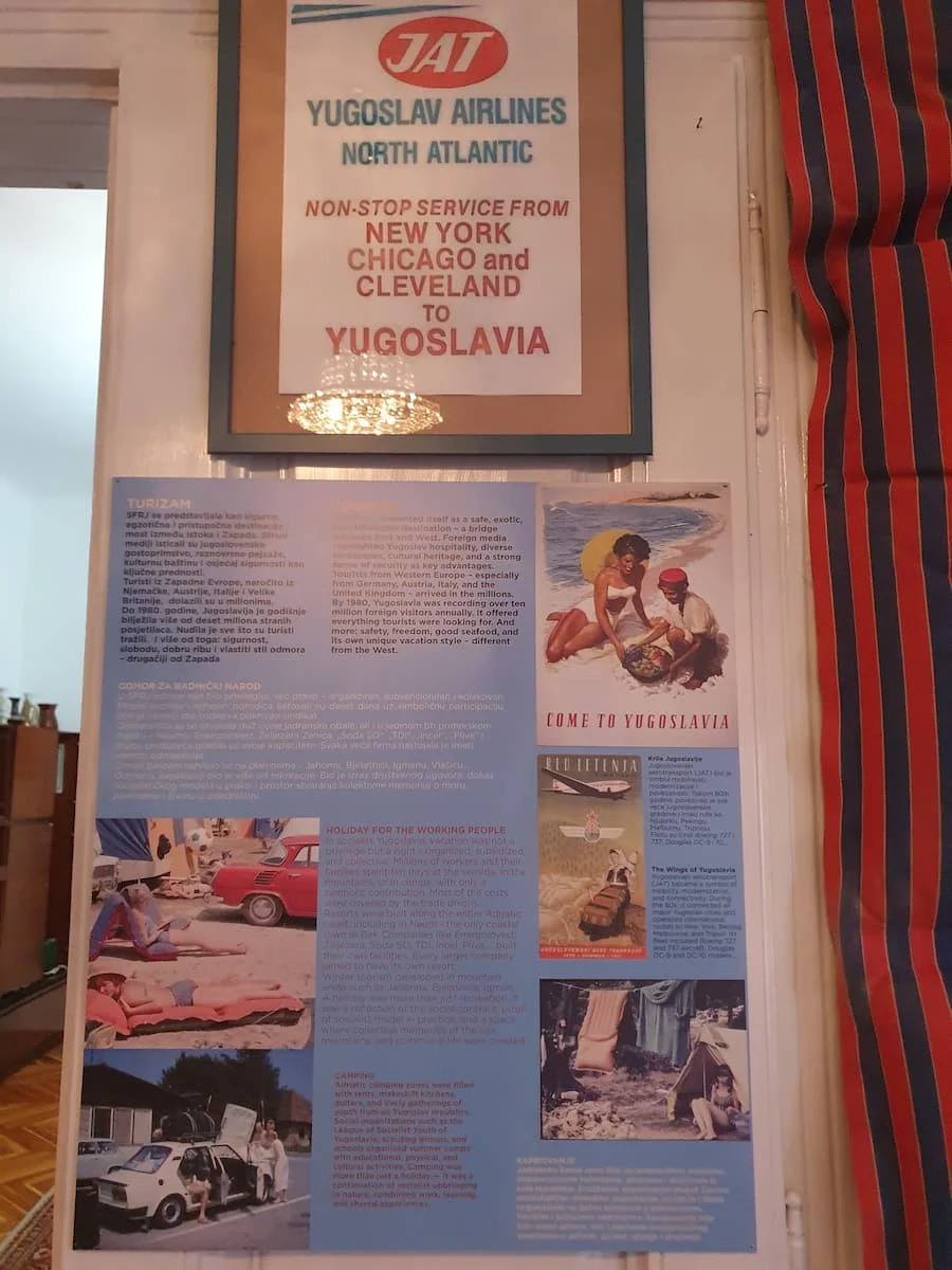 a poster for JAT Yugoslav Airlines at the sarajevo 80s museum in bosnia