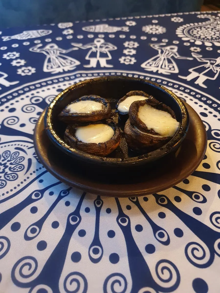 a ketsi dish filled with soko kecze georgian stuffed mushrooms from lurji sufra restaurant in batumi georgia