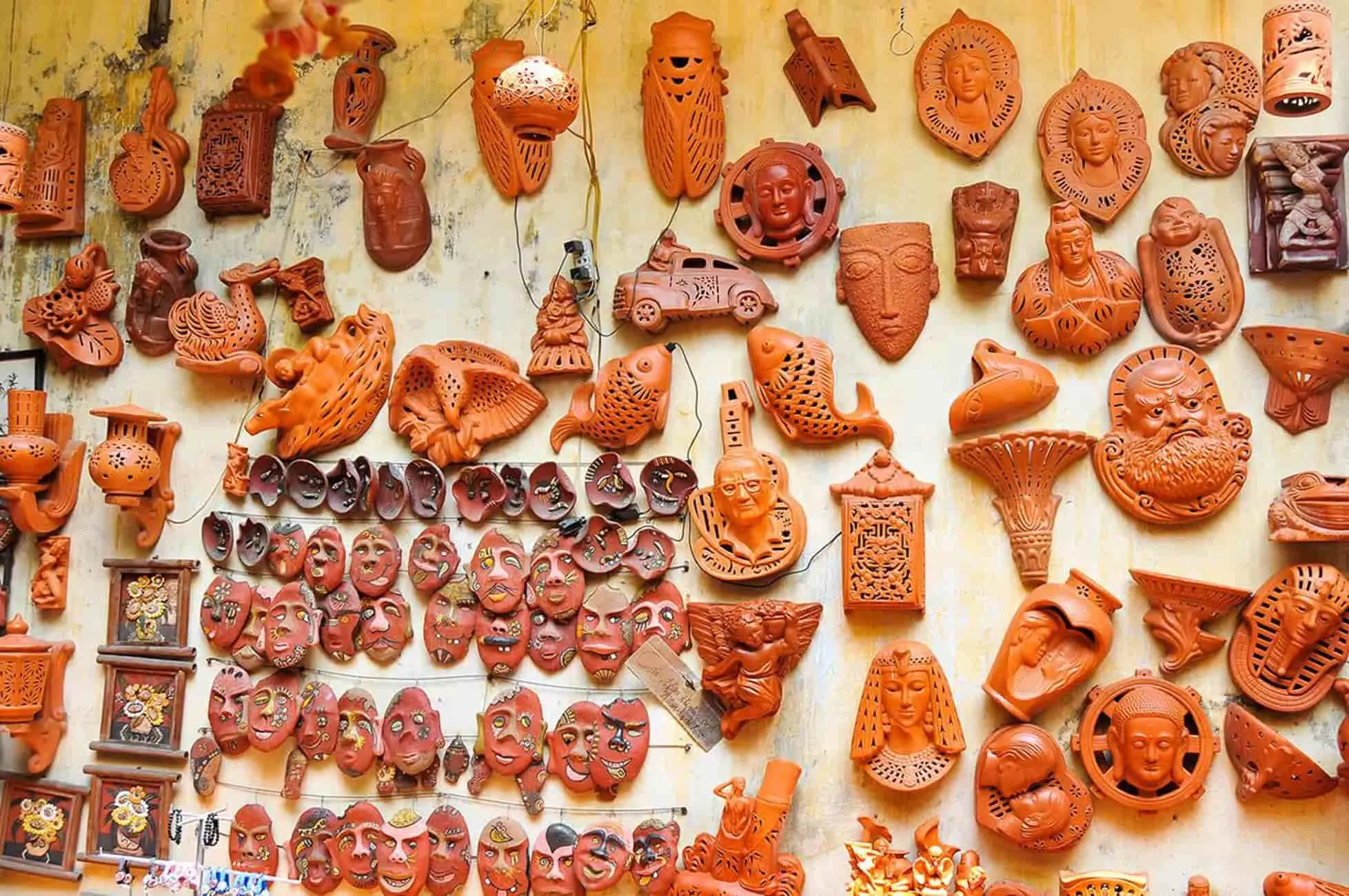 Traditional clay masks and other decorative motifs