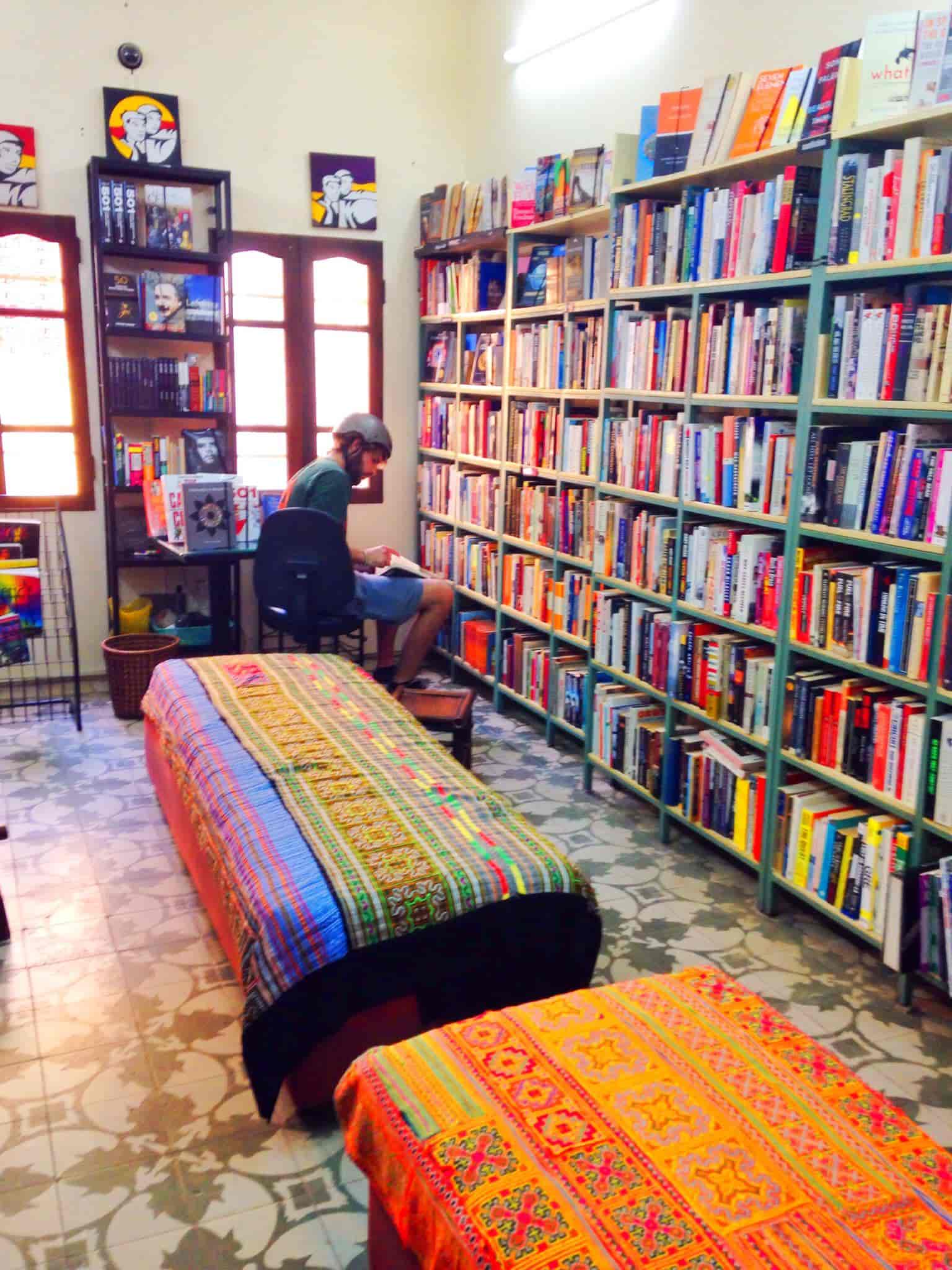 Bookworm Hanoi book shelf choosing books