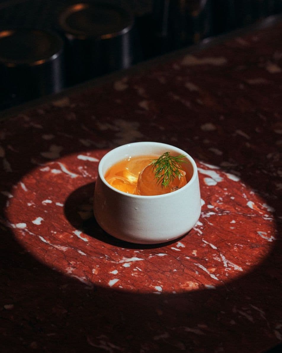 Cocktail or soup? Drinks presented creatively on marble red tables