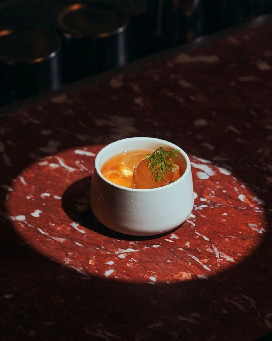 Cocktail or soup? Drinks presented creatively on marble red tables