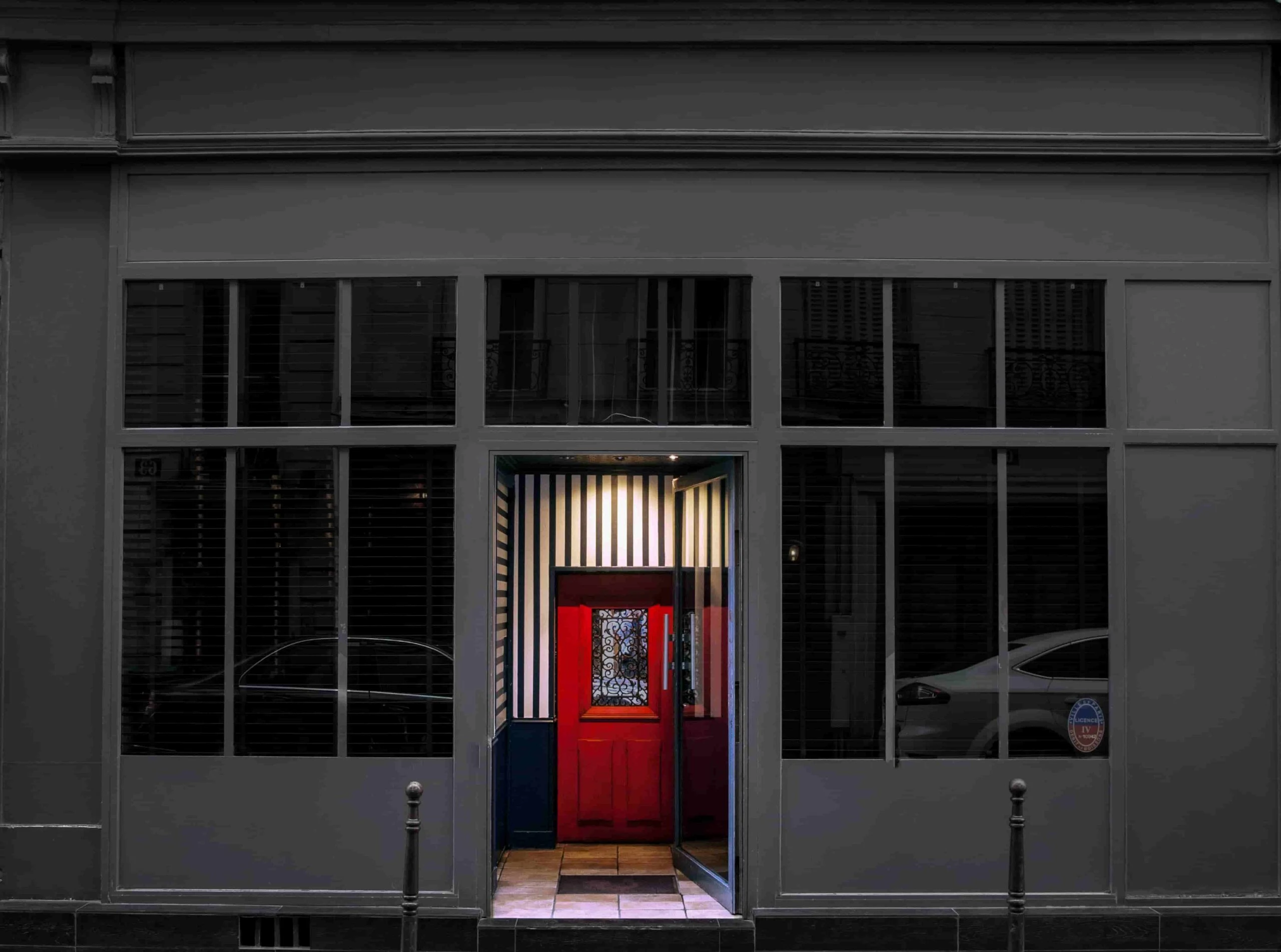 Red door entrance to this bar