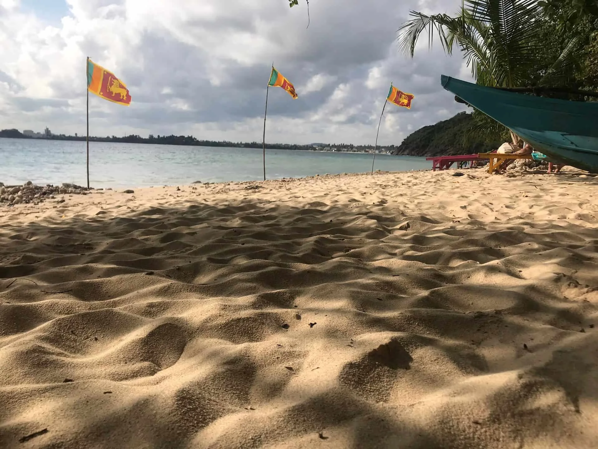 Jungle Beach with Sri Lankan flag poles