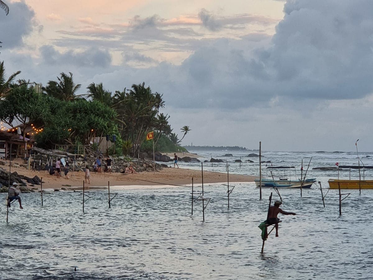 Stilt fishermen in the bay