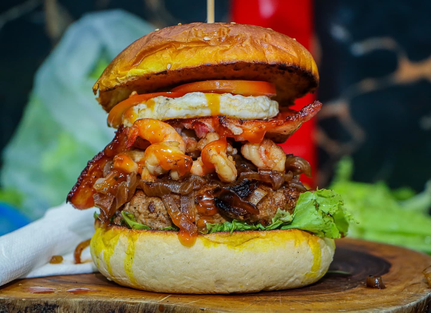 surf and turf burger with beef and prawns and bacon