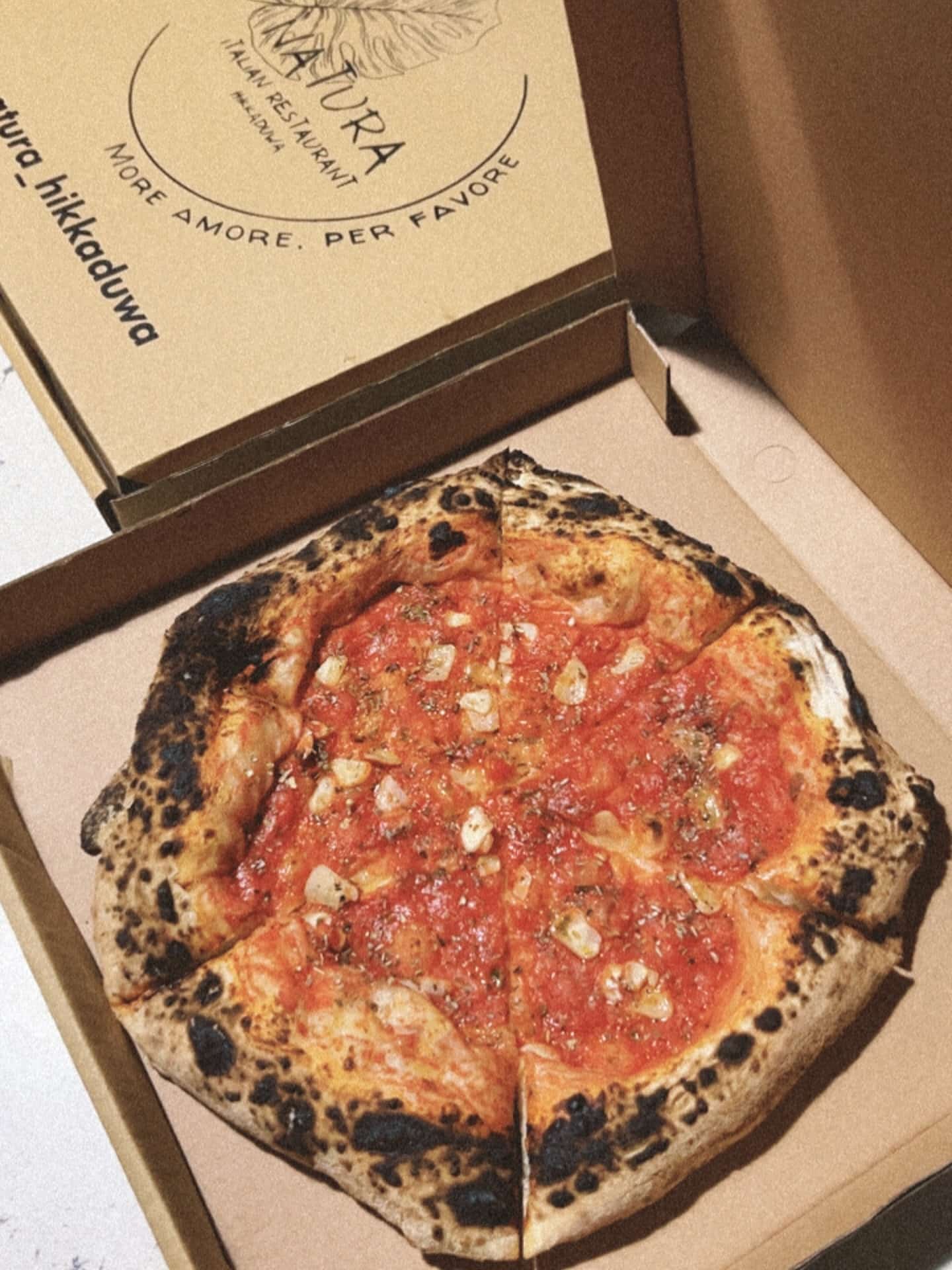 Naples-style wood fired pizza