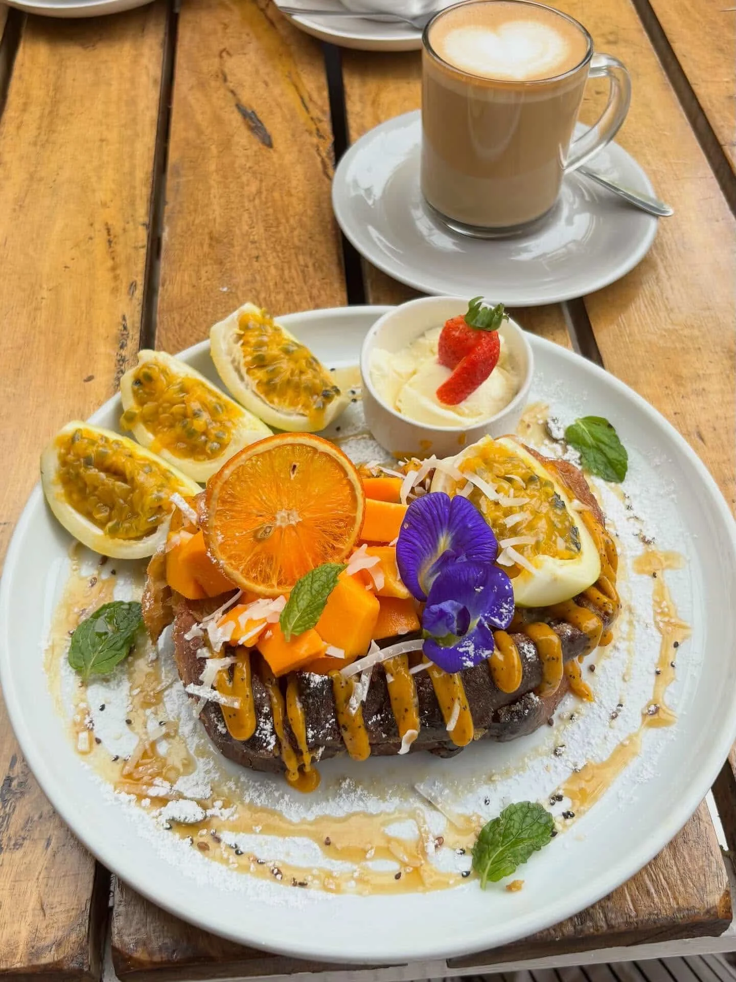 Breakfast toast with fresh fruits and latte