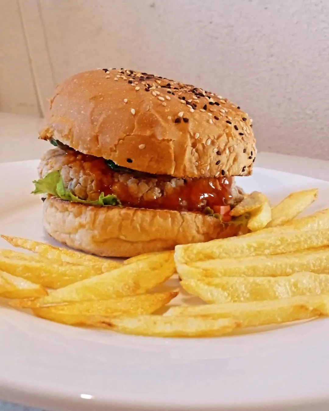 Lentil burger and french fries