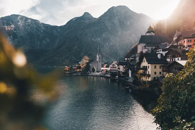 a village and church beside an alpine lake in hallstatt austria an unusual day trip from vienna