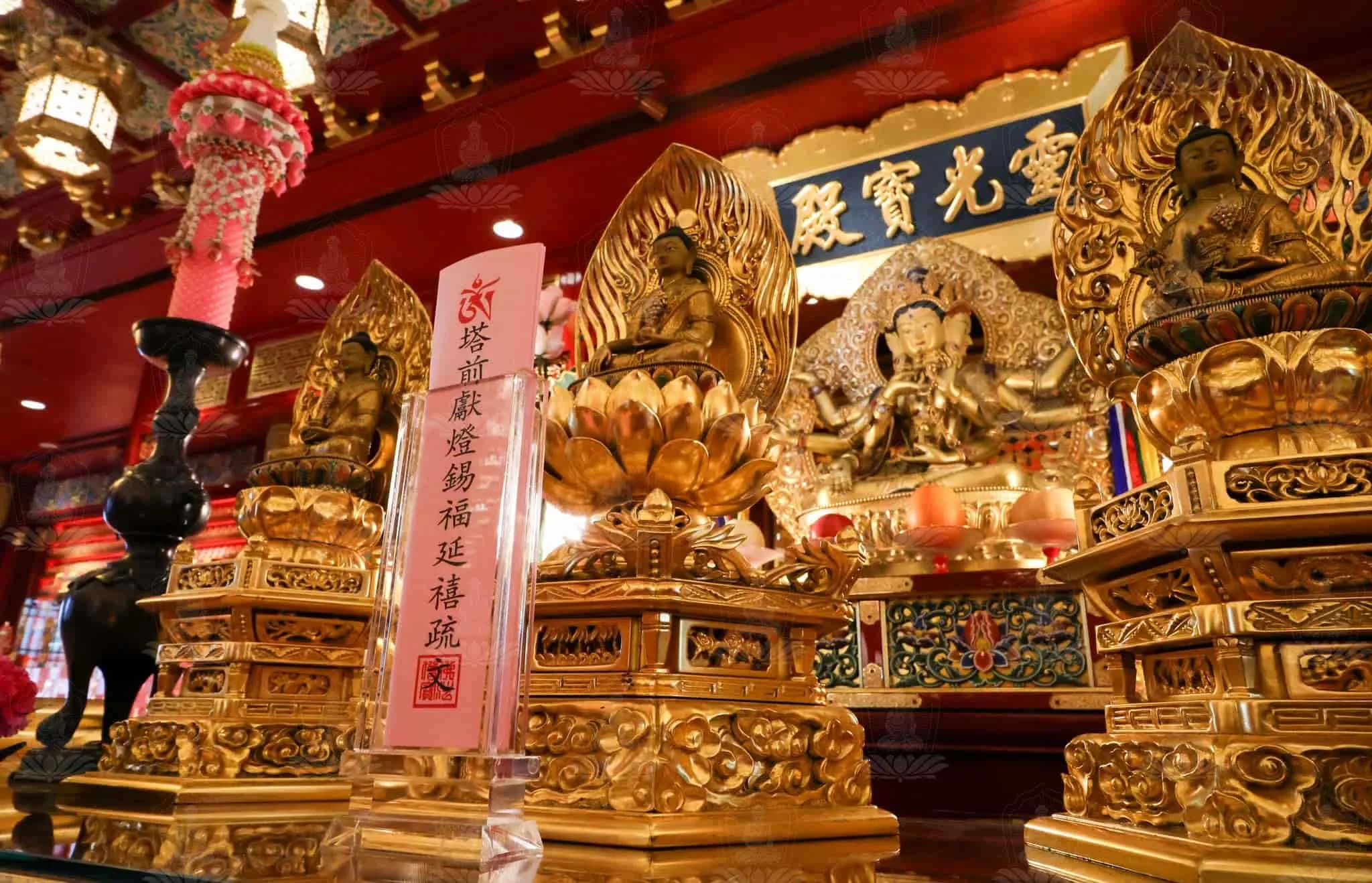 Golden Buddha figurines within the temple