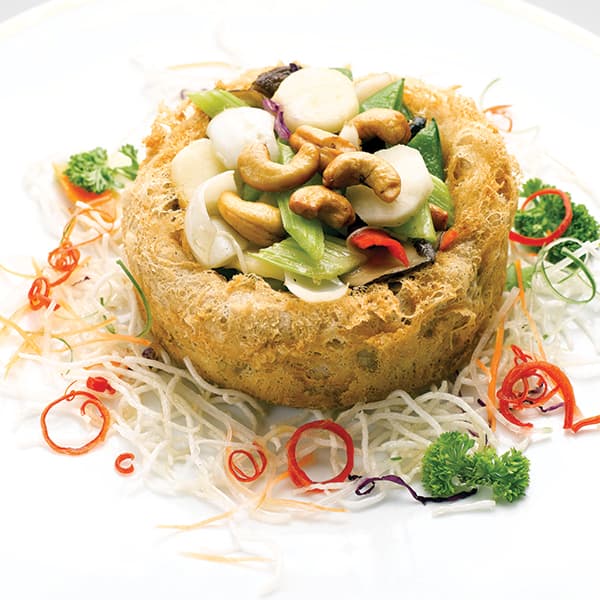 Handmade yam ring filled with vegetables