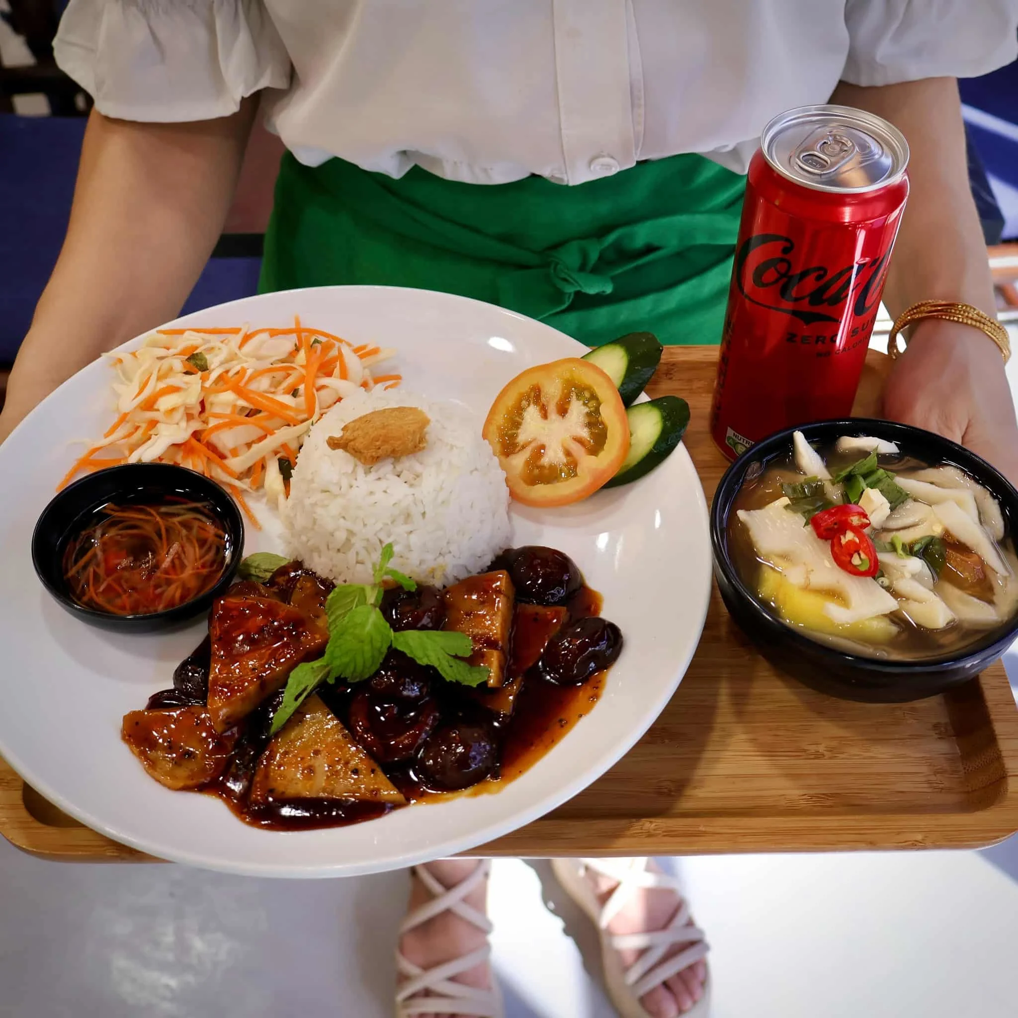 A classic Vietnamese lunch time meal with ricr served with side soup