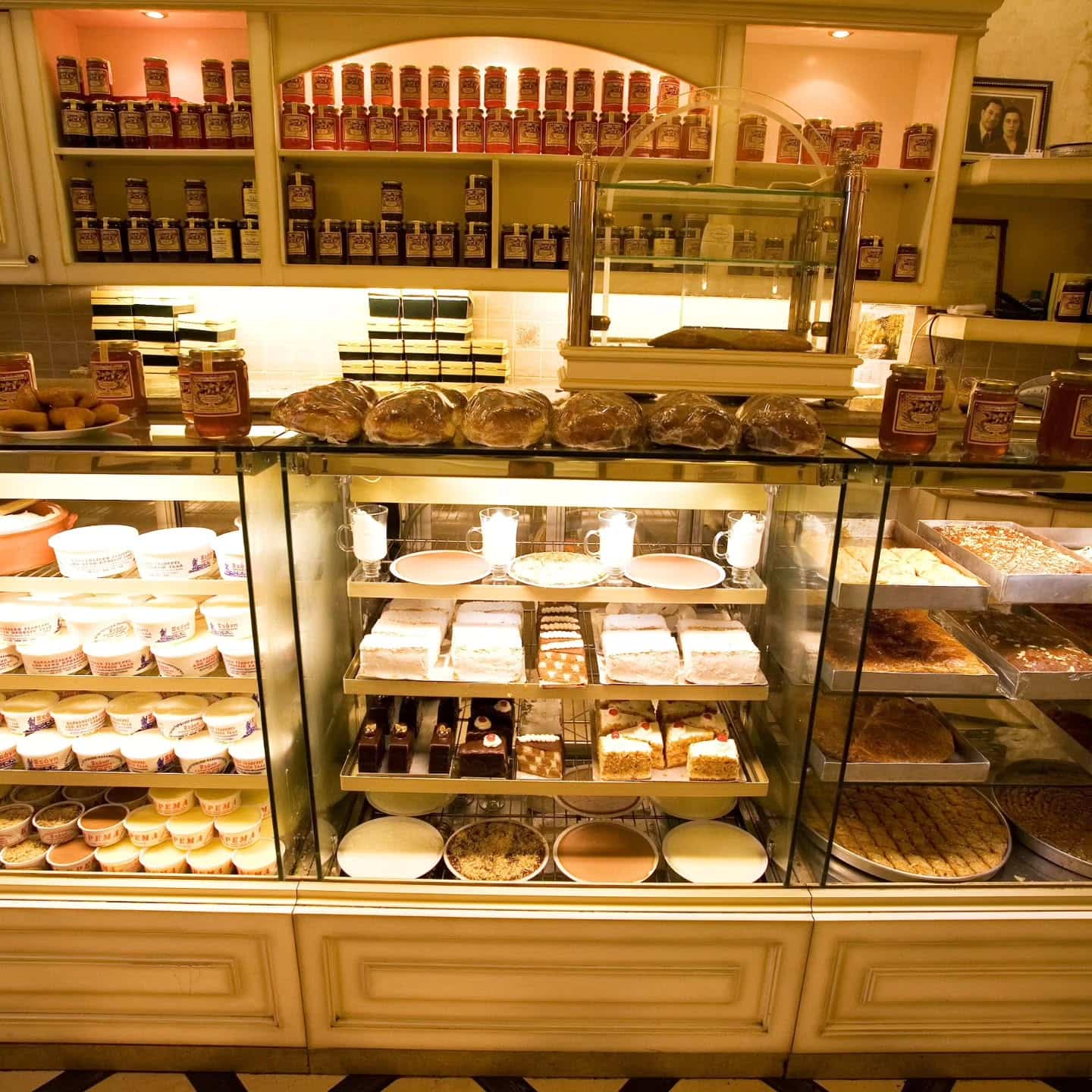 Counter filled with desserts and pastries