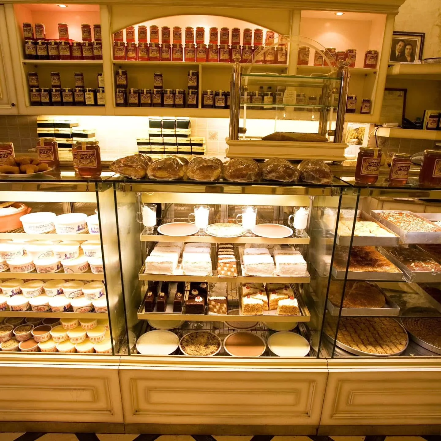 Counter filled with desserts and pastries