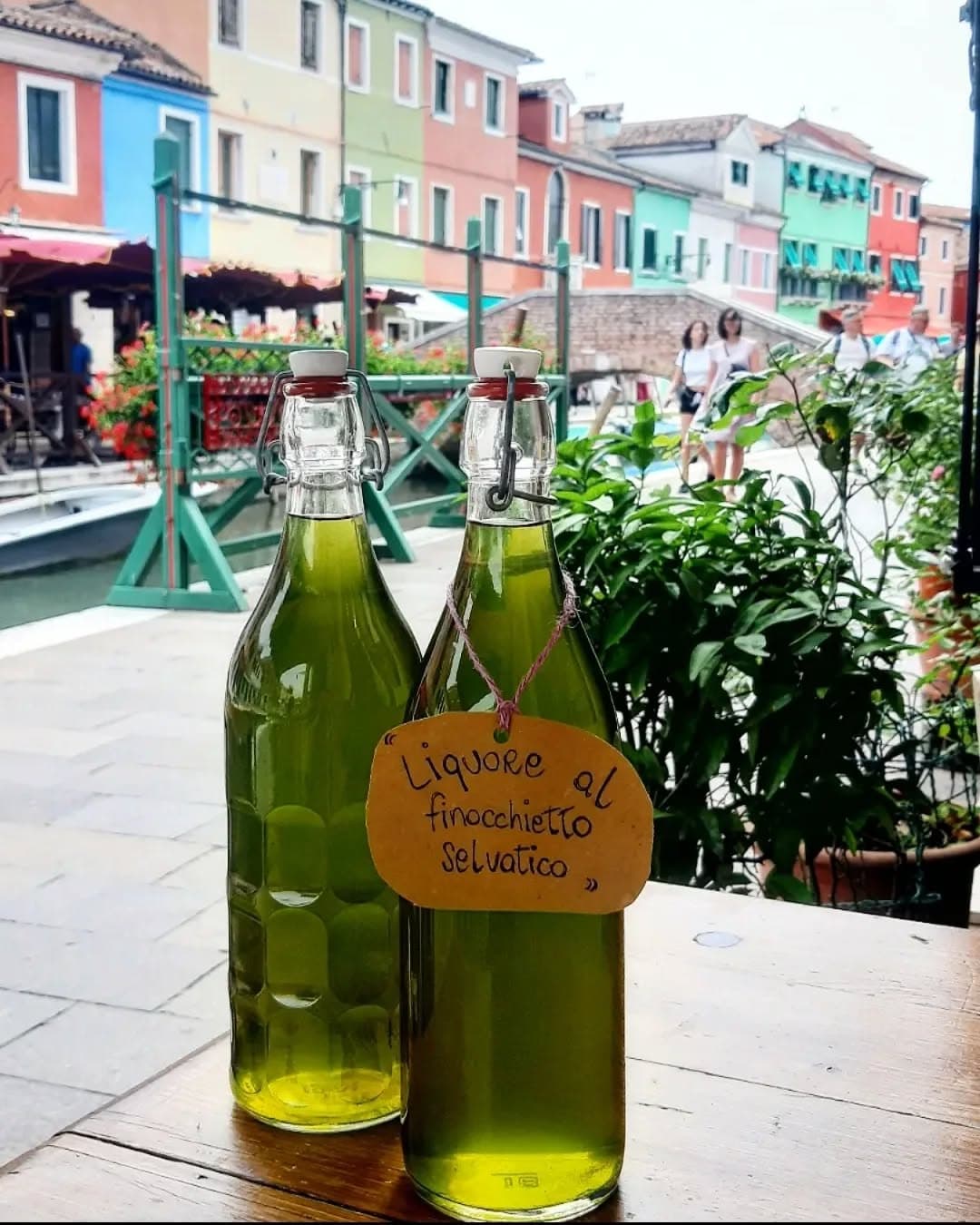 Bottles of liquer in Burano at waterfront restaurant