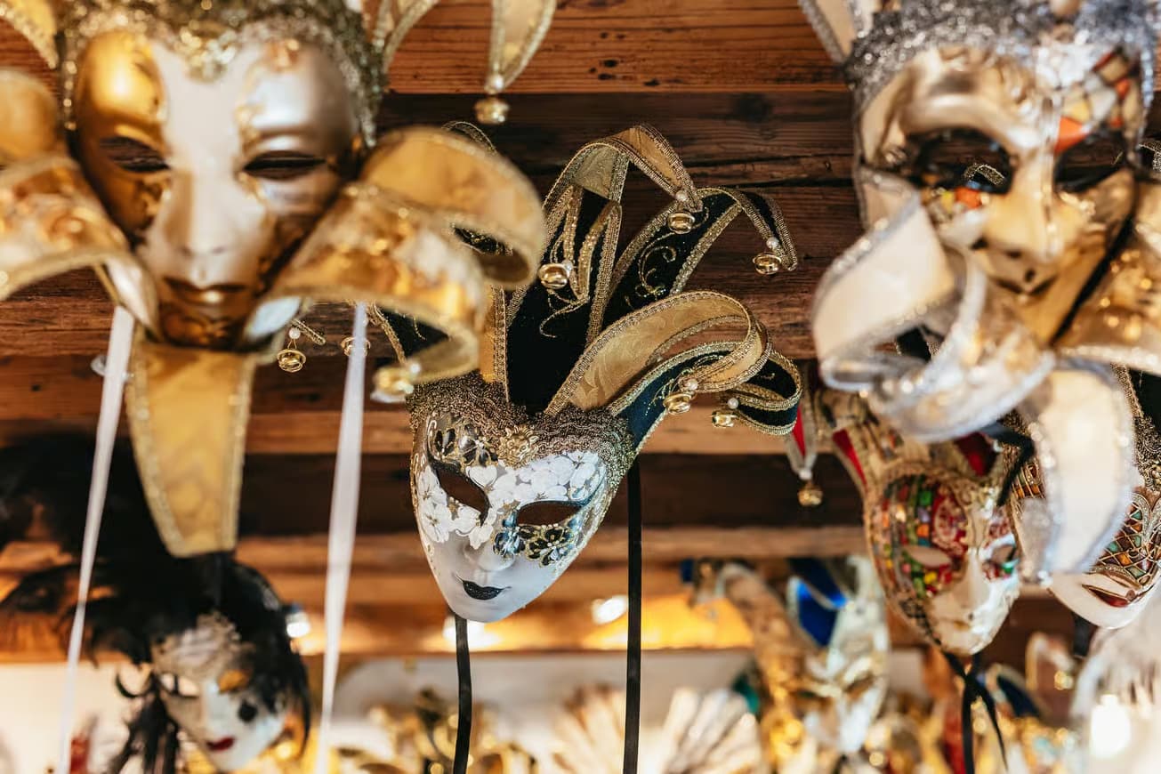 Traditional Venitian masks hanging from the ceilings