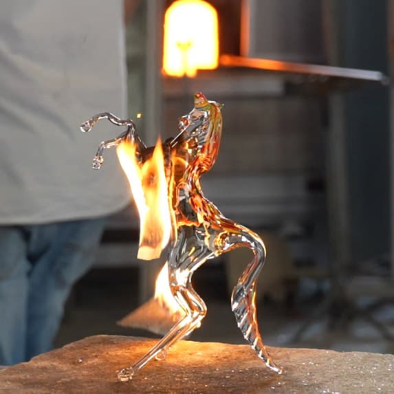 A glass figurine getting the final kiss of fire