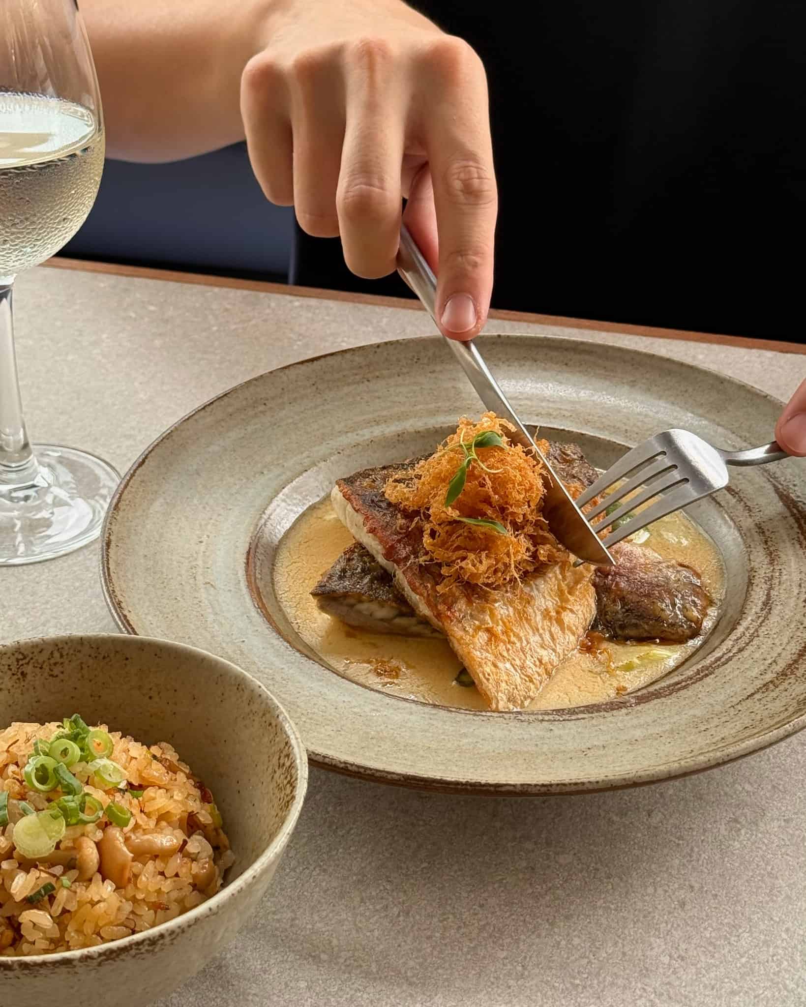 Fresh Barramundi, grilled asparagus, and forest mushroom Japanese rice