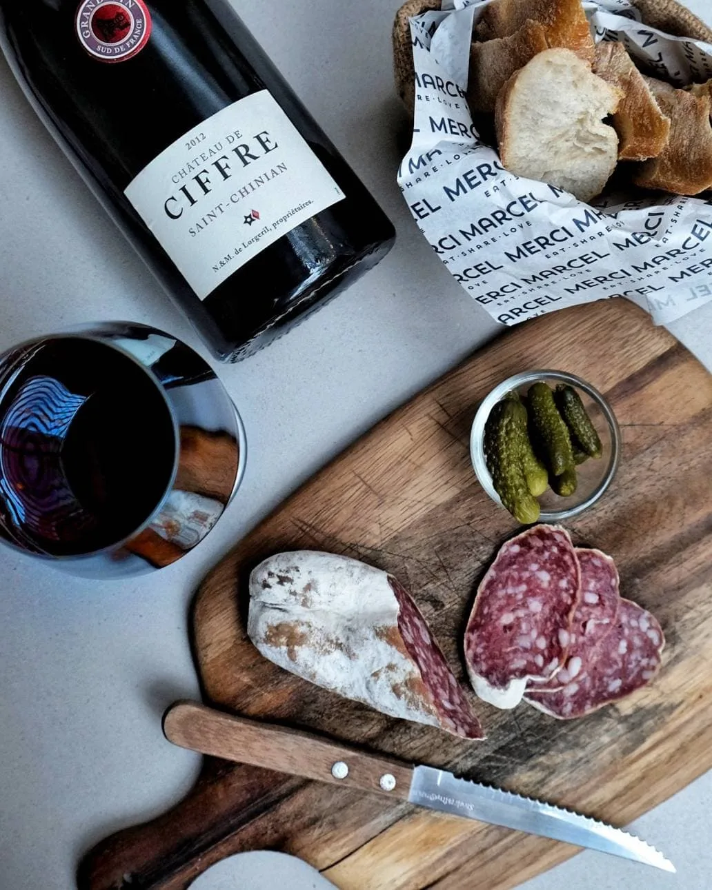 Wine, salami, pickles and breads