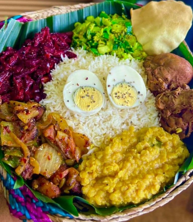 A typical Sri Lanka breakfast with rice, egg, potatoe and dahl