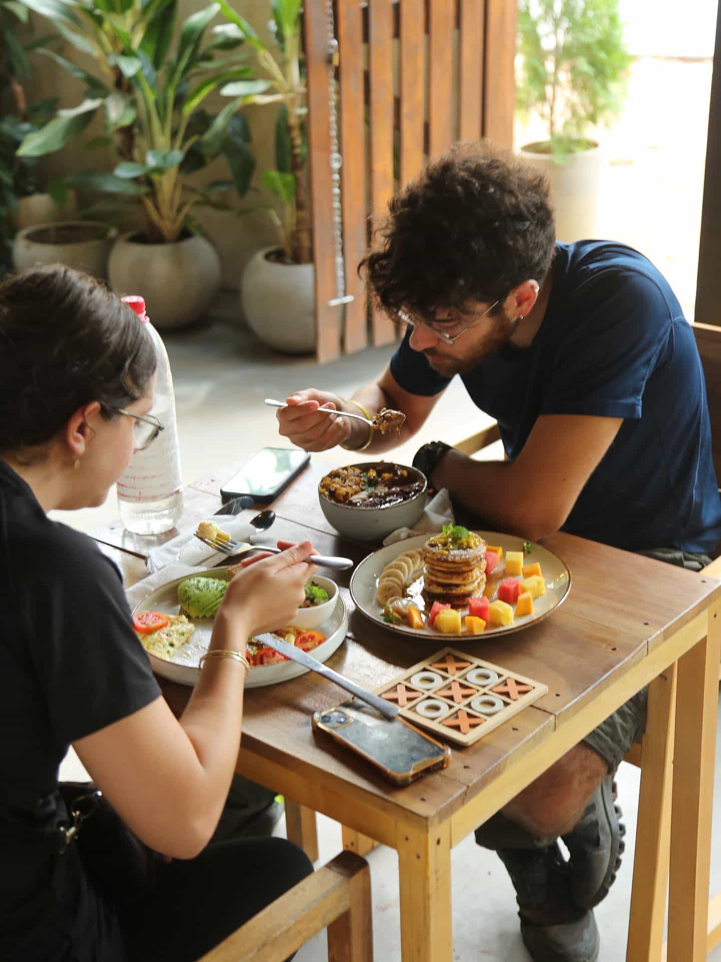 Pancake stack, granola and board games