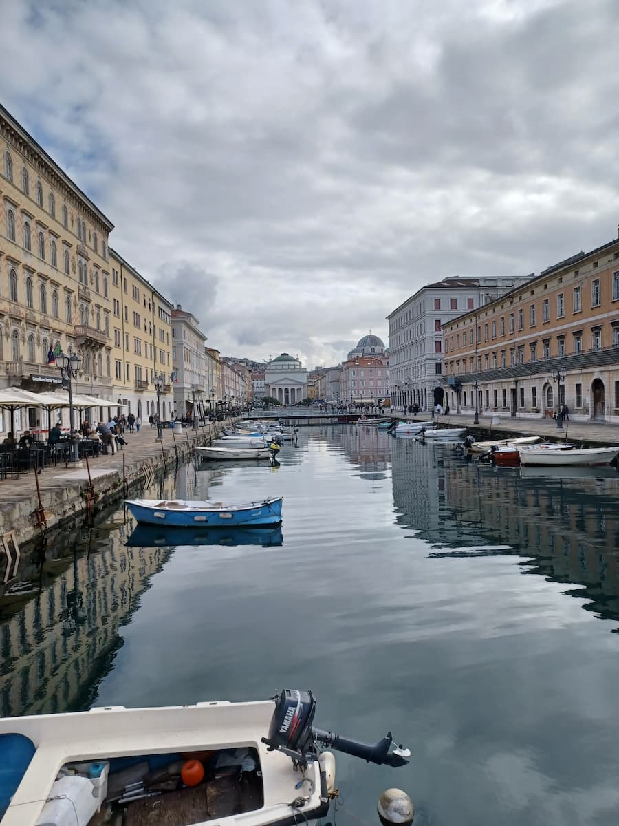 boats moored on the grand canal trieste italy